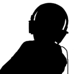 Child wearing headphones while using a learning app
